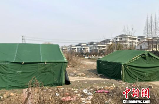 图为被拆除的考古帐篷已恢复。 崔佳明 摄 图为被拆除的考古帐篷已恢复。 崔佳明 摄