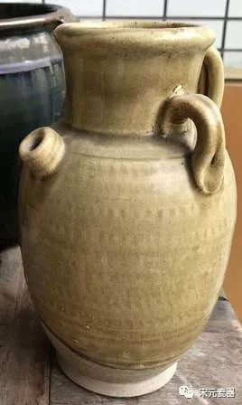 一真一假说瓷器(102-唐代黄釉席纹执壶)